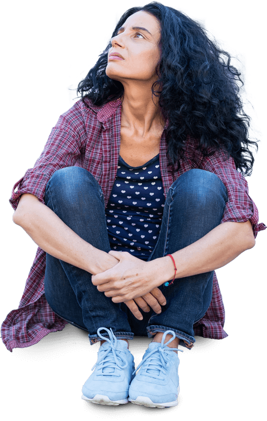 Woman sitting looking upwards