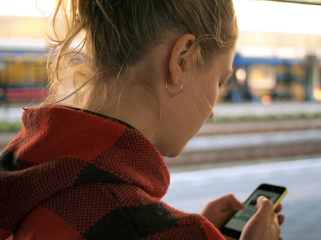 Girl looking at her phone